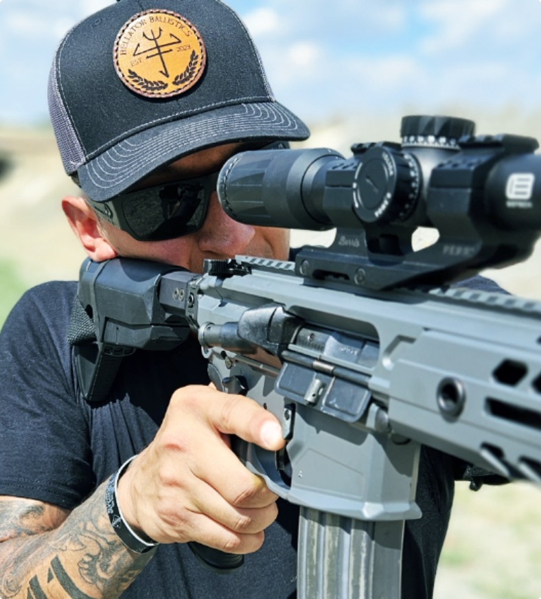 Bellator Ballistics hat with custom branded patch design, training and shooting photography