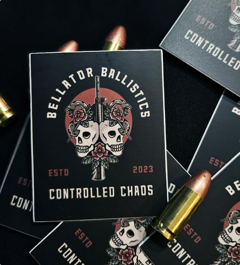 Bellator Ballistics sticker design of gun, skulls, snakes and roses